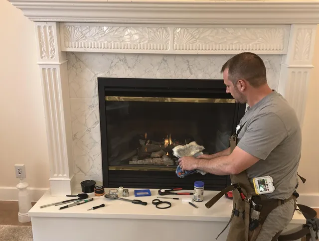 Pine Hills Chimney Sweep performing fireplace maintenance in Pine Hills, FL